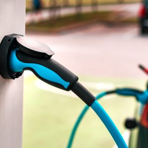 Electric vehicle charging station point, closeup of unit plug